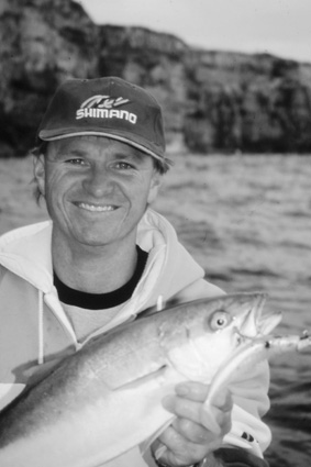 Scotty Lyons with a kingfish from a few years back that was caught at Henry Head in Botany Bay.